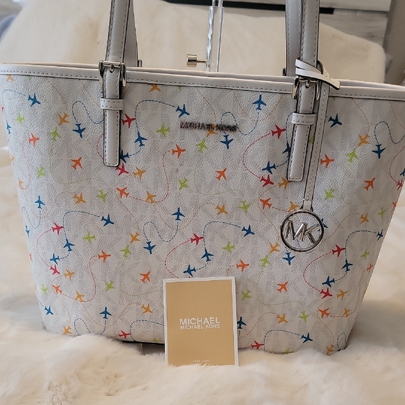 Michael Kors Handbags - Michael Kors Jet Set Tote With Airplane Design